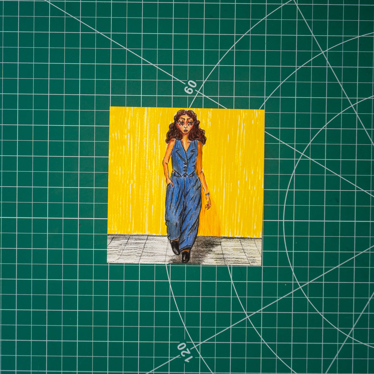 Colored pencil composition of a girl walking forward in a navy suit with billowing pants and a vest with a lapel. She has caramel-colored skin and dark brown hair, one hand in her pocket. A shadow falls across the gray floor beneath her, with a bright yellow wall behind.